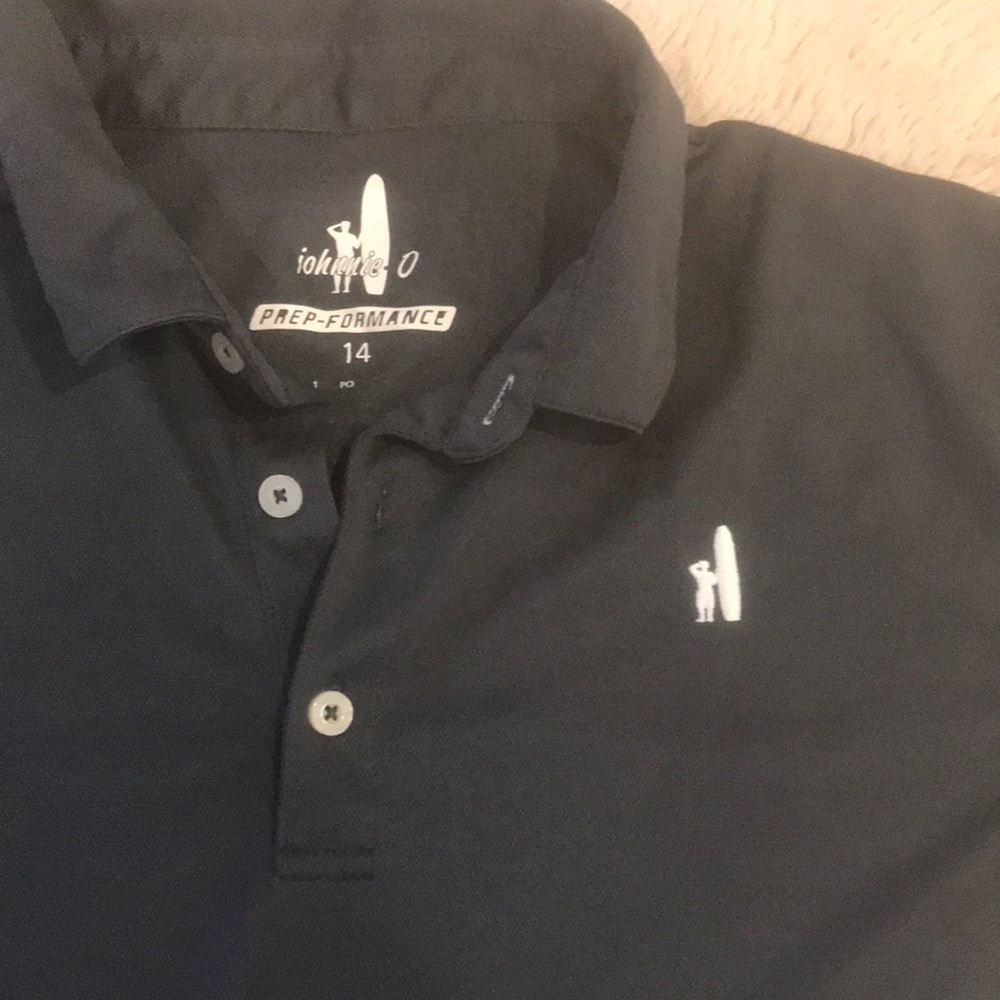 Johnny-O Short sleeve golf shirt. Size 14 boys